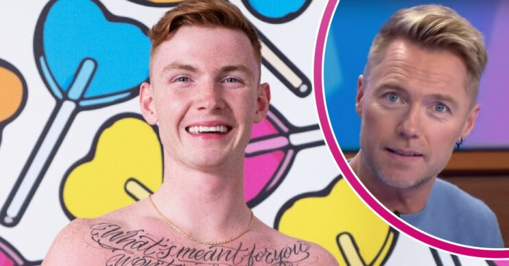 Jack Keating smiles, Ronan Keating looks to camers