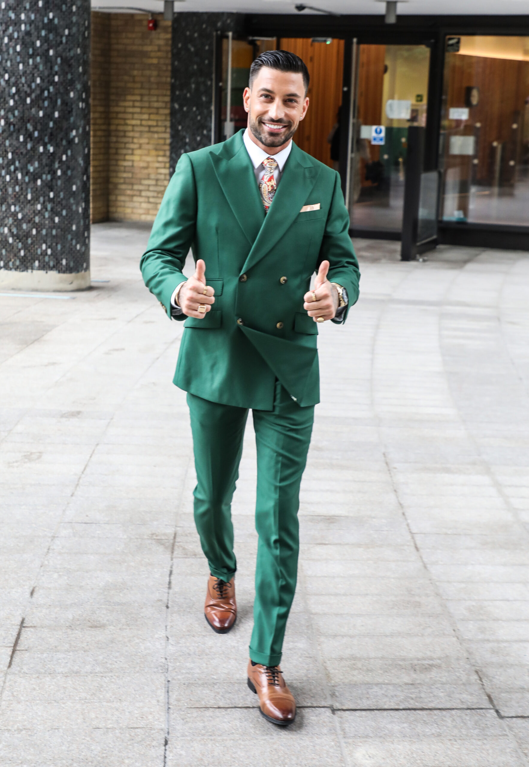 Giovanni Pernice smiling wearing green