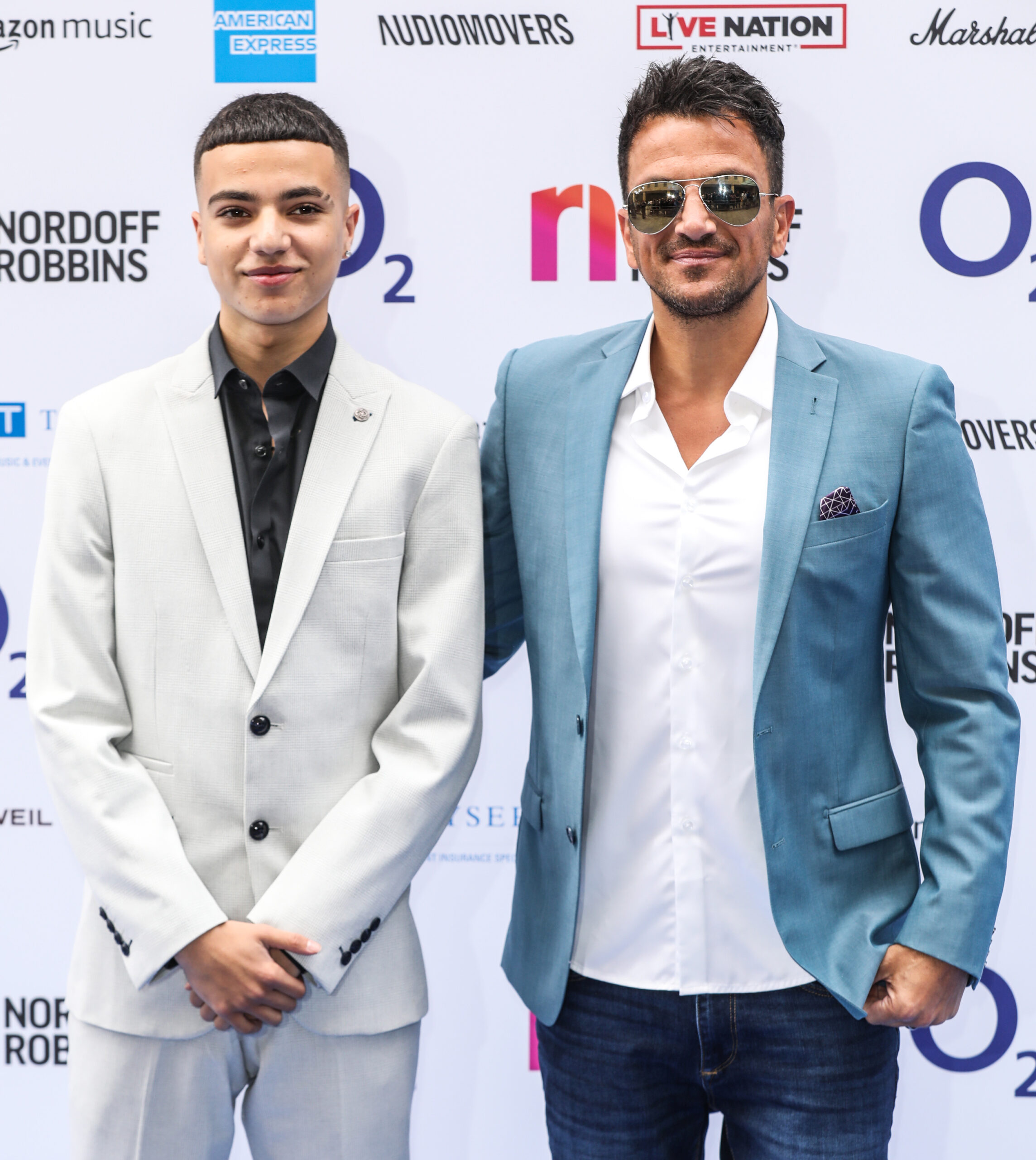 Peter Andre and Junior Andre smiling