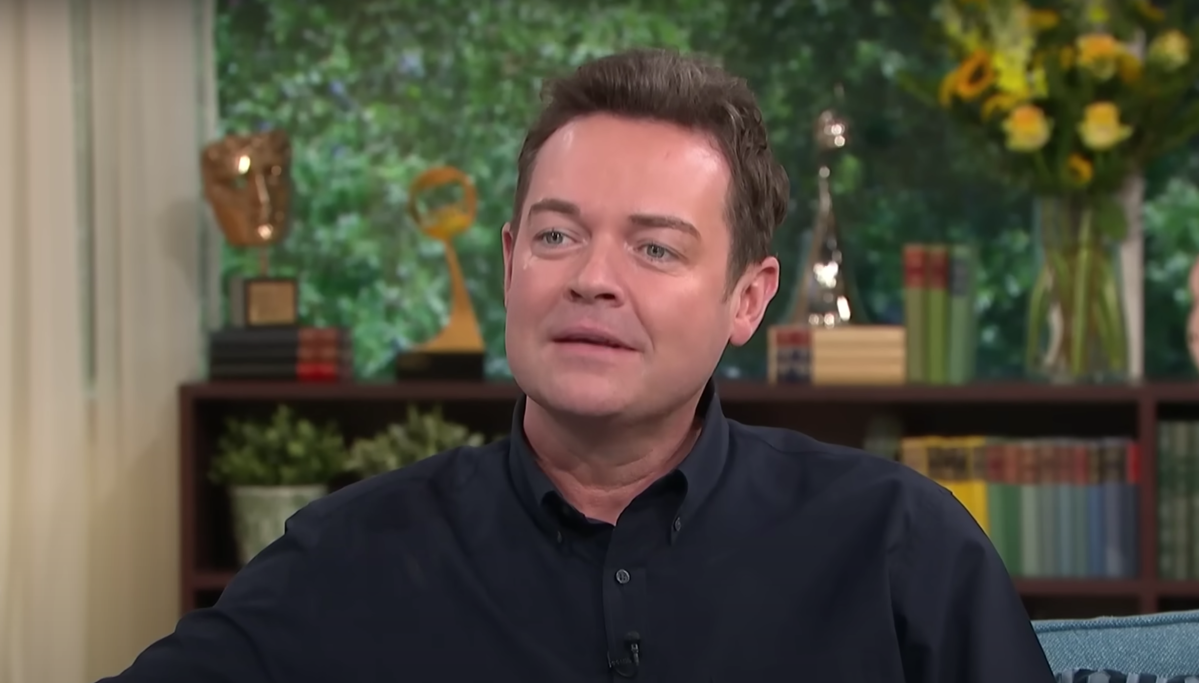Stephen Mulhern being interviewed on This Morning wearing black