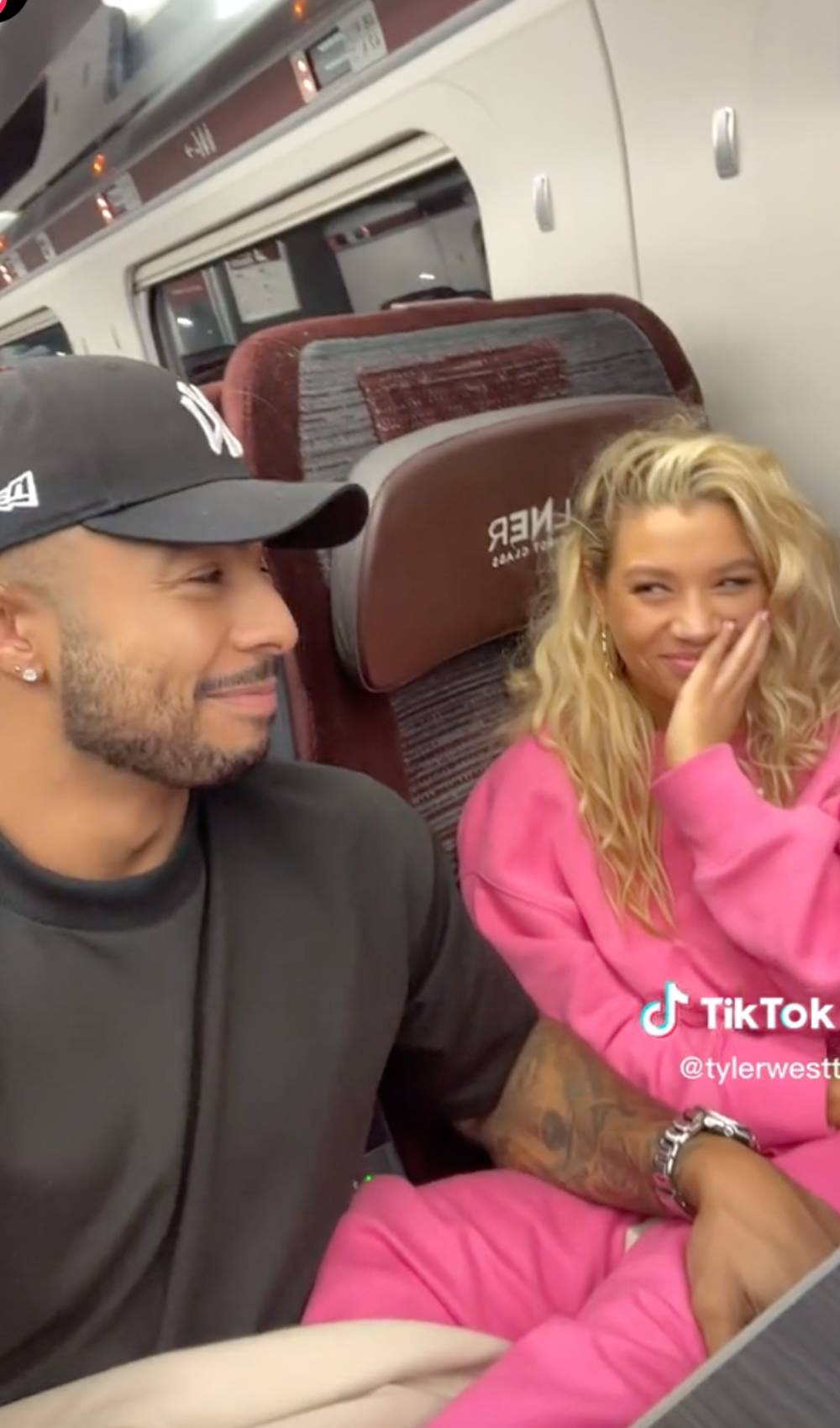 Strictly stars Tyler West Molly Rainford smile at one another