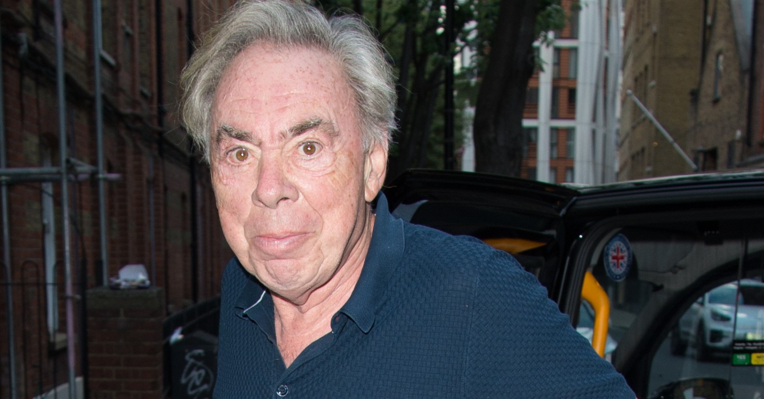 Andrew Lloyd Webber smiling outside 
