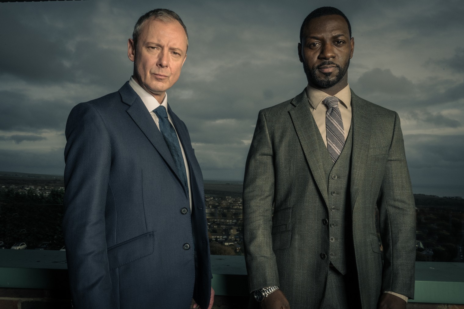 DS Roy Grace and DS Branson frown in Grace series 3