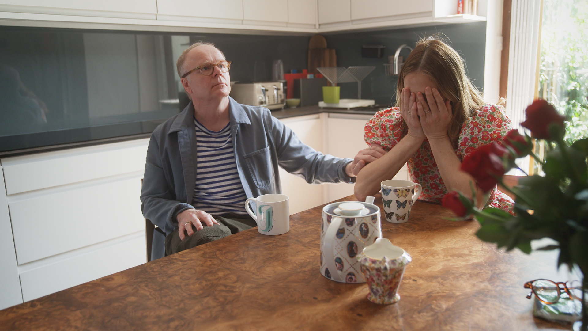 Jason Watkins comforts his wife Clara as she breaks down in tears