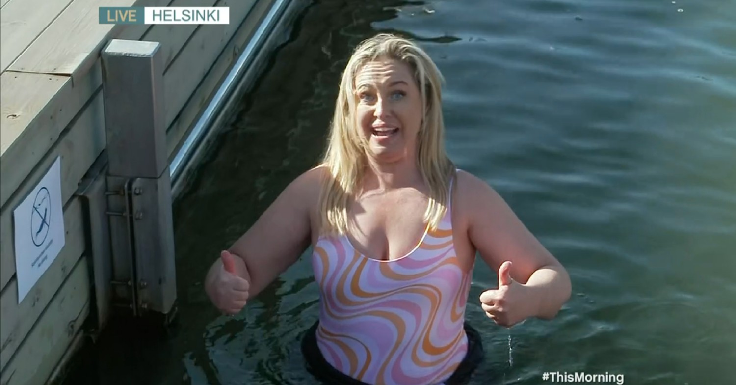 Josie Gibson giving thumbs up in the water on This Morning today