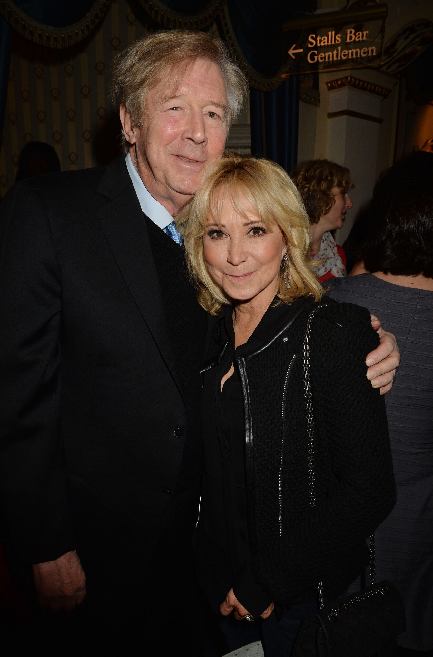 Felicity Kendal and Michael Rudman smiling at event