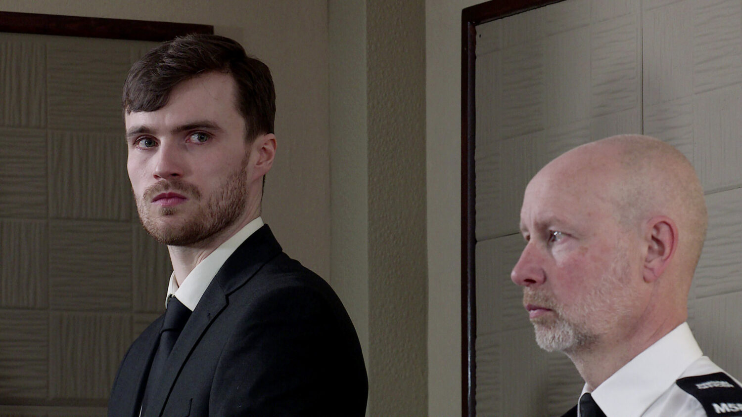 Justin looking threatening at court on Coronation Street