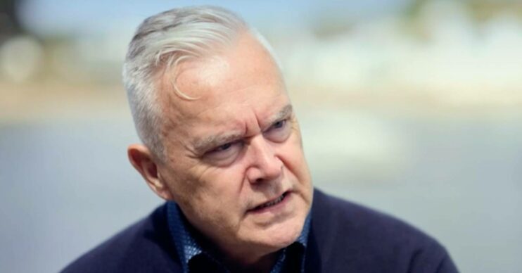 Huw Edwards looks serious
