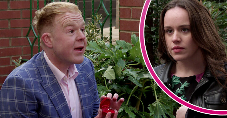 Coronation Street's Craig is holding up a ring as he bends down on one knee and, in a bubble, is Faye