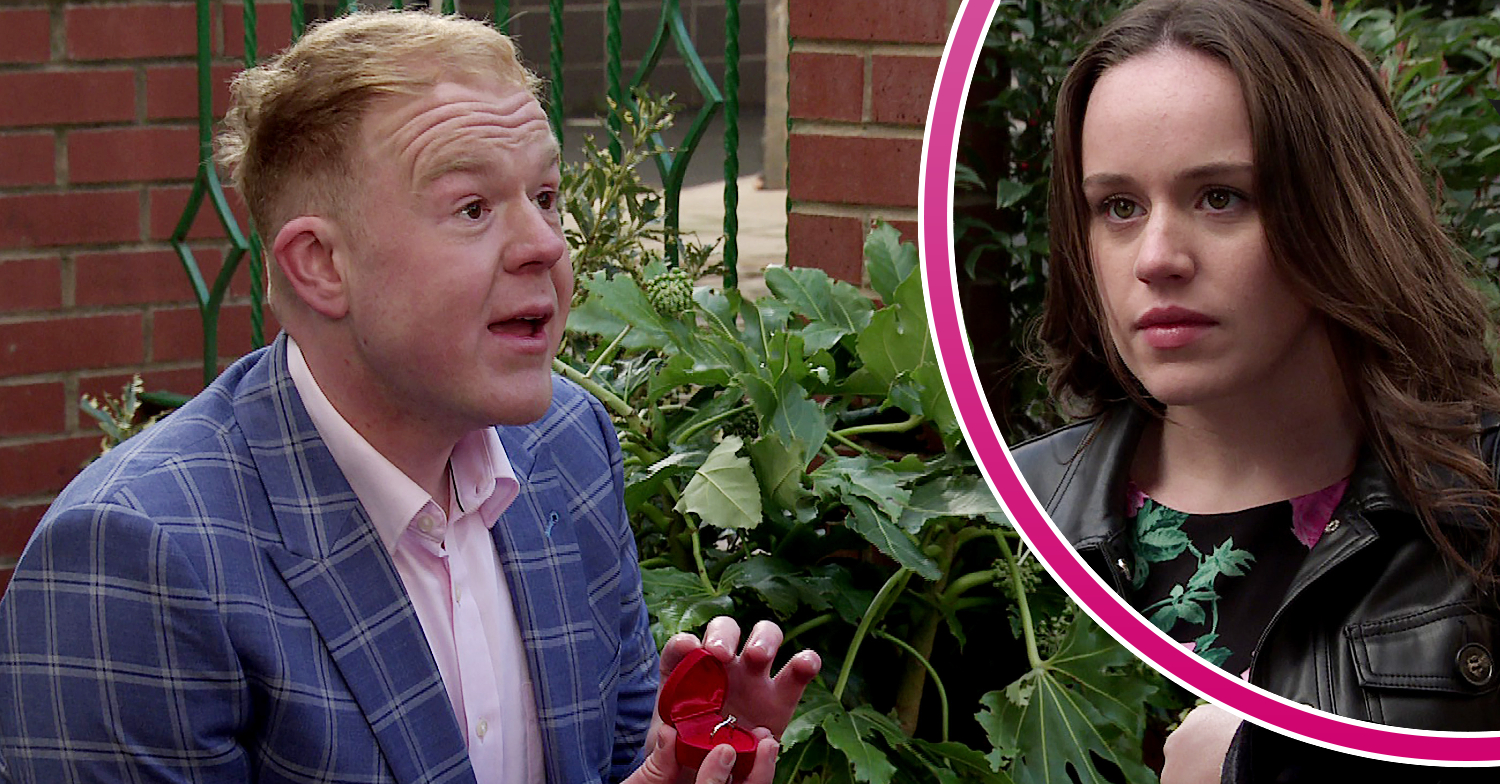 Coronation Street's Craig is holding up a ring as he bends down on one knee and, in a bubble, is Faye