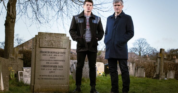 Emmerdale's Nicky and Caleb are standing outside of Frank Tate's headstone