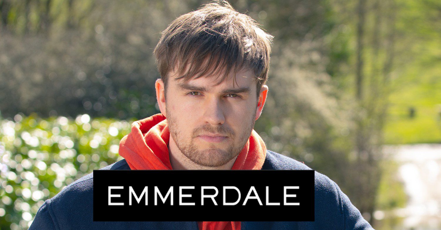 Emmerdale's Tom King with the Emmerdale logo comp image