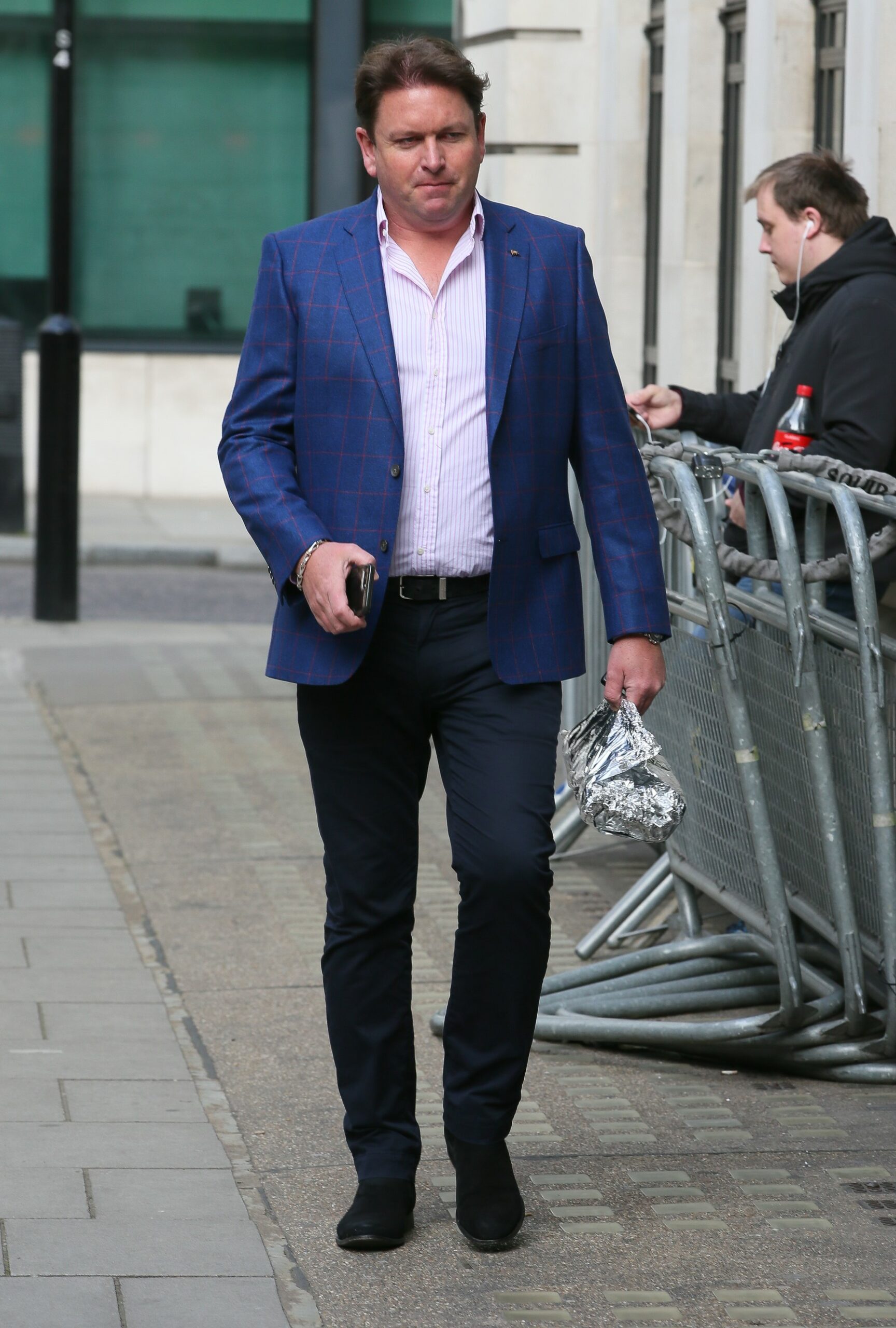 James Martin walking with blue blazer on