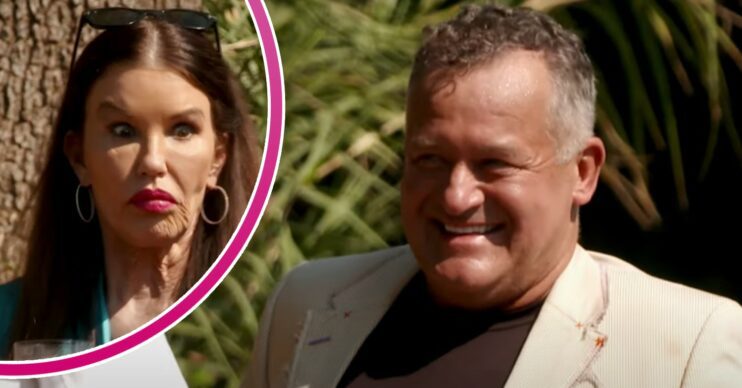 Janice Dickinson looking shocked and Paul Burrell smiling on I'm A Celebrity South Africa