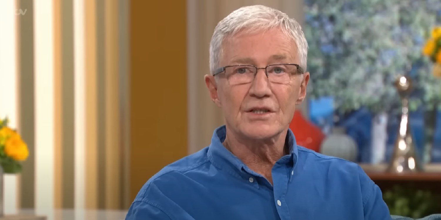 Paul O'Grady speaking in blue shirt on This Morning