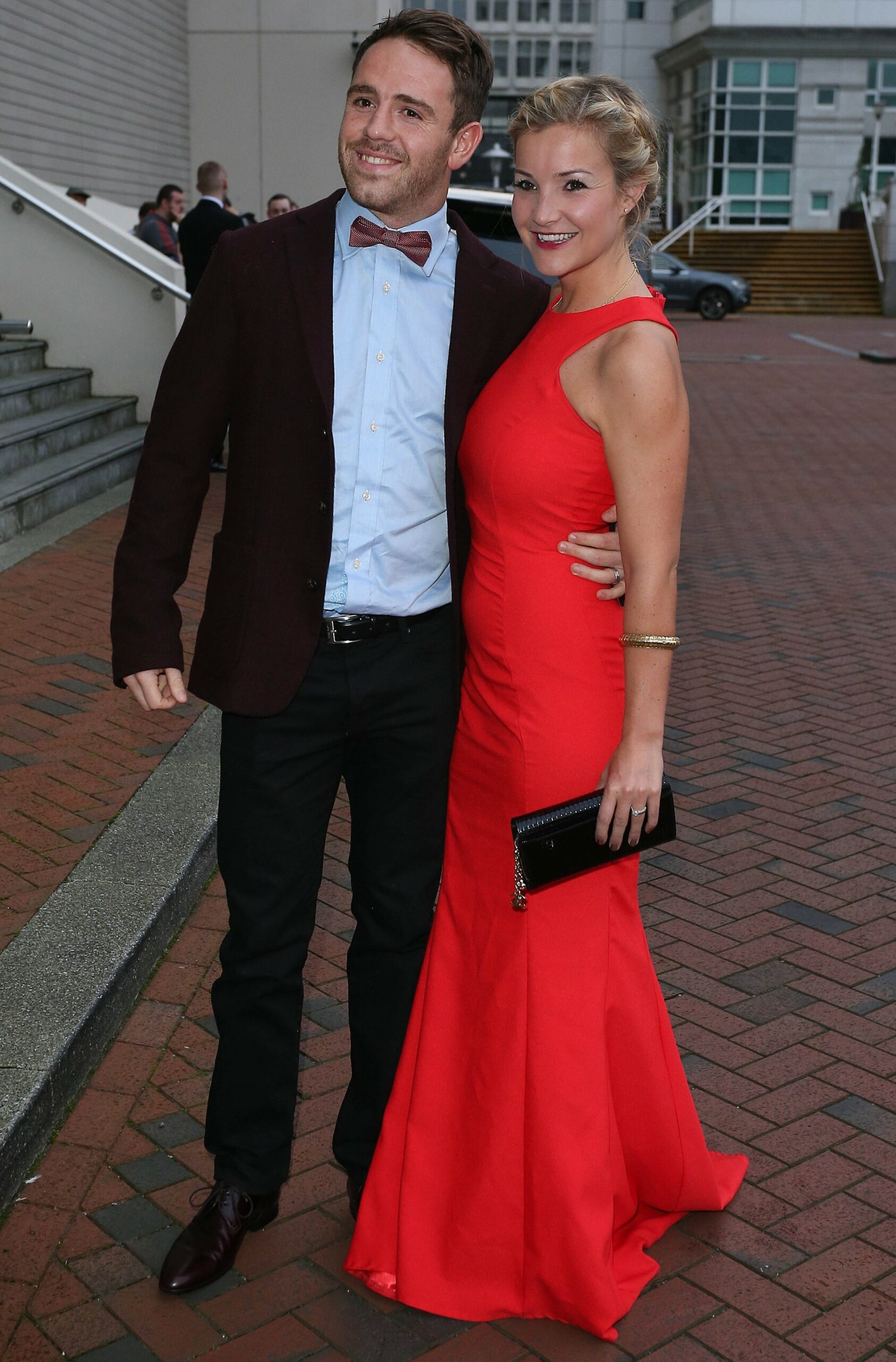 Richie Myler and Helen Skelton smiling at event