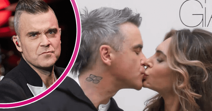 Robbie Williams and Ayda Field kissing