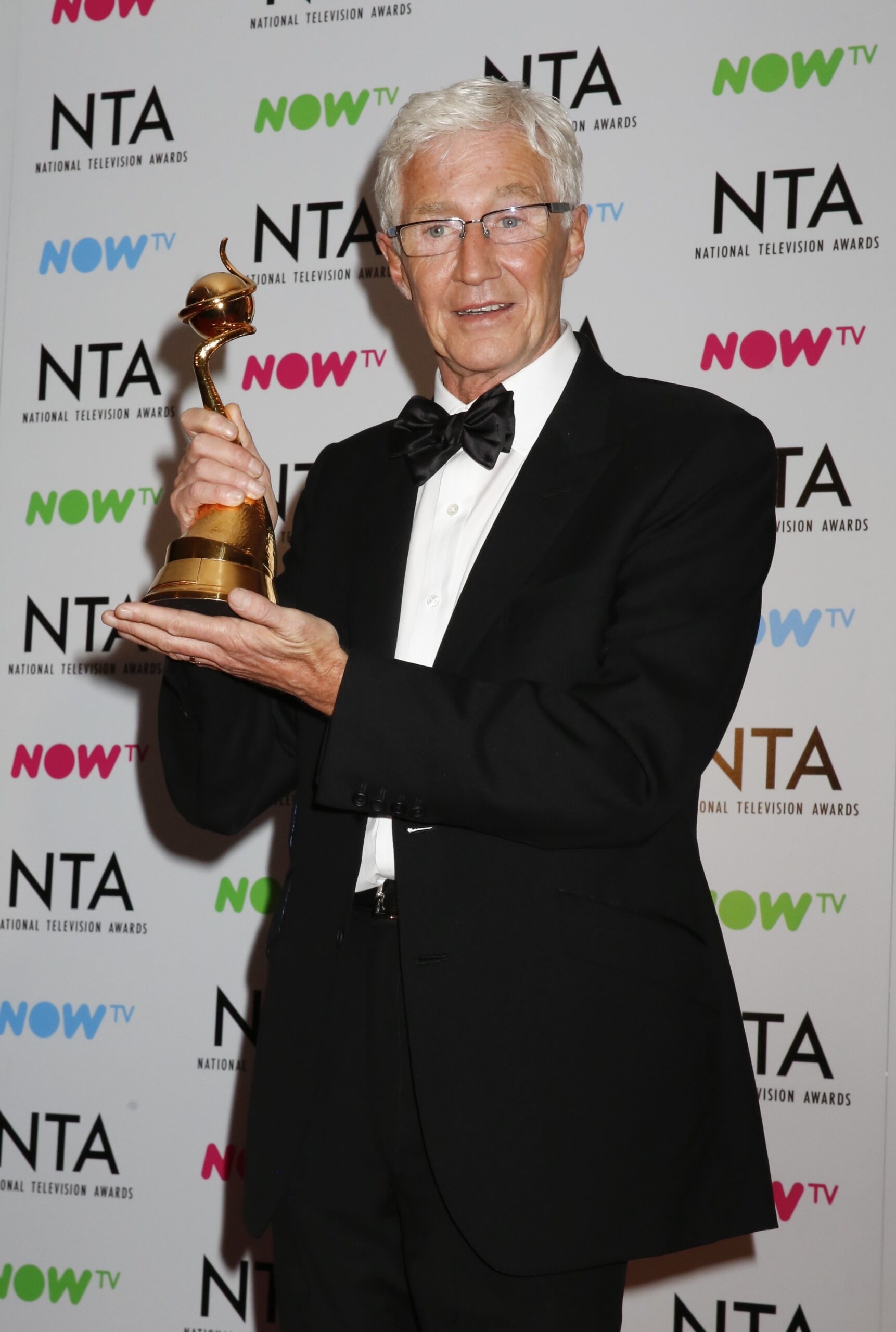 Paul O'Grady holding his National Television Award