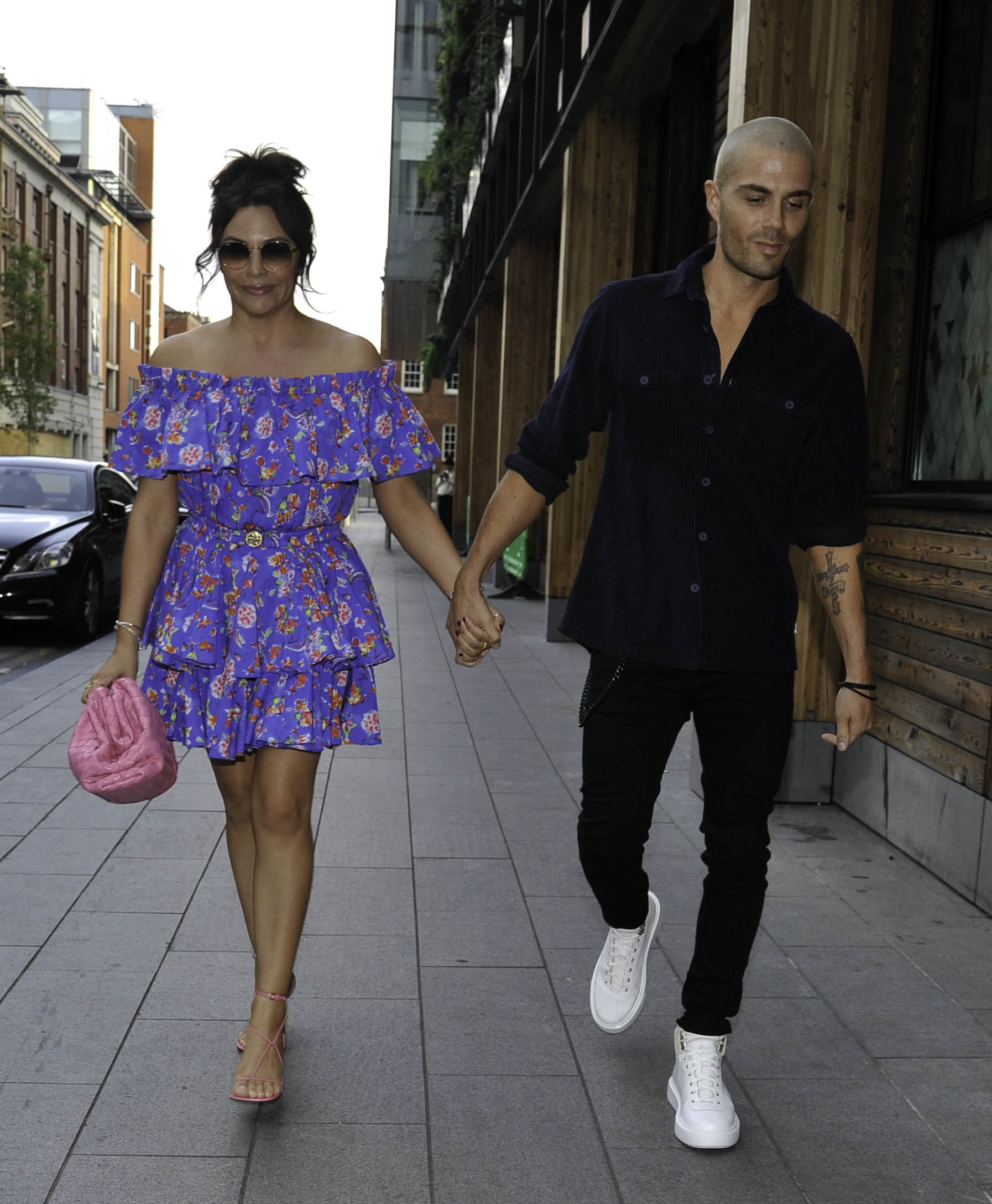 Stacey Giggs and Max George holding hands