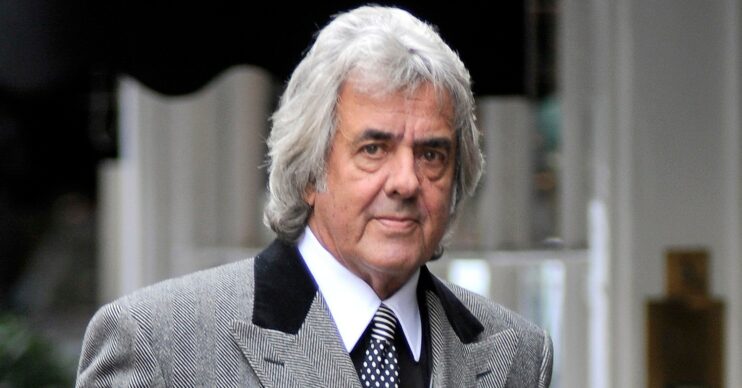 David Dickinson looking grim