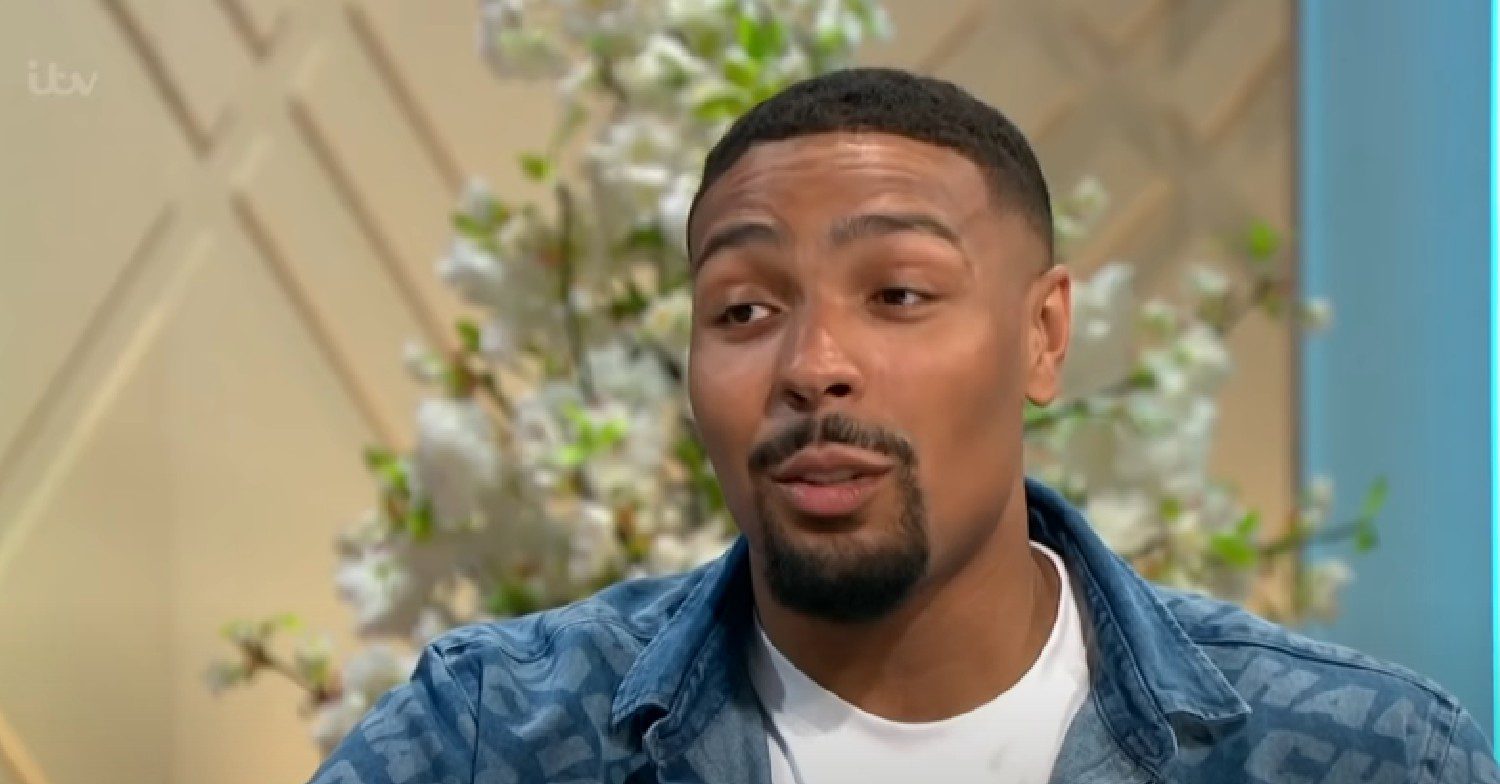 Jordan Banjo speaking in denim jacket on Lorraine