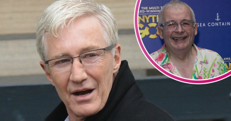 Paul O'Grady looking stern with Christopher Biggins smiling