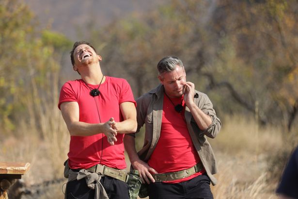 Joe Swash and Dean Gaffney smile