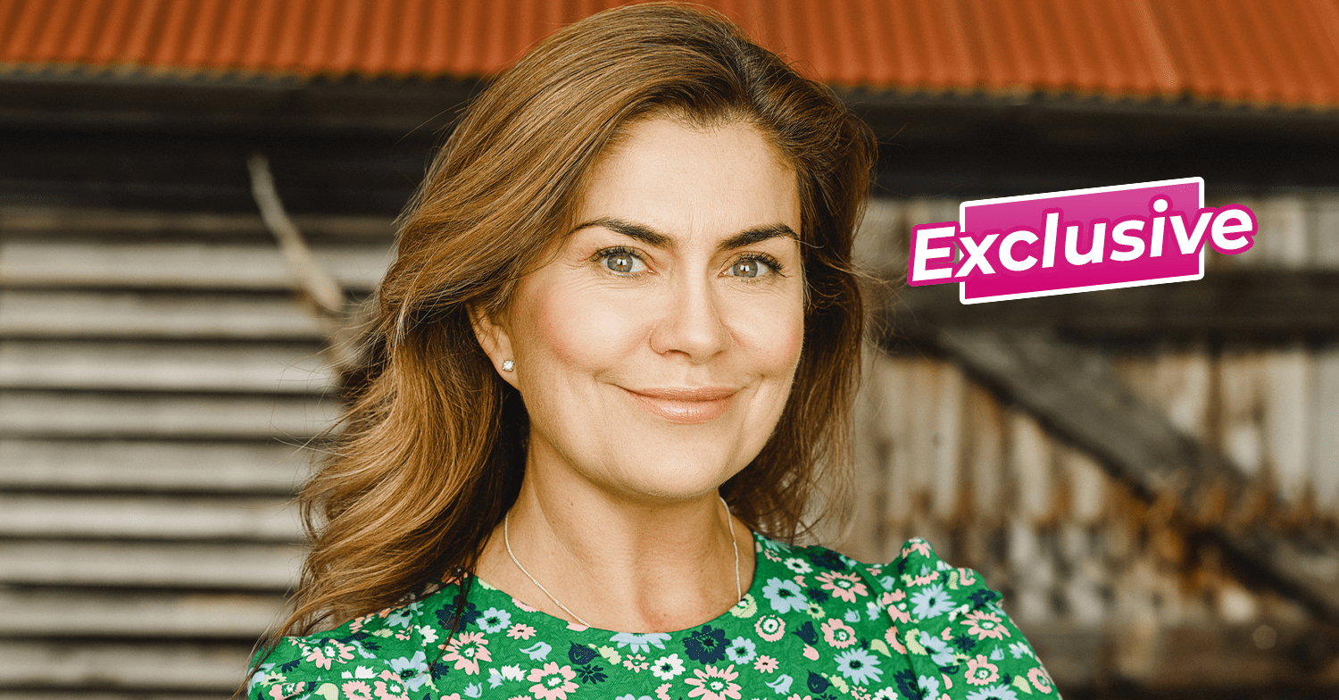 Amanda Lamb smiling in front of the Saved and Remade Workshop barn