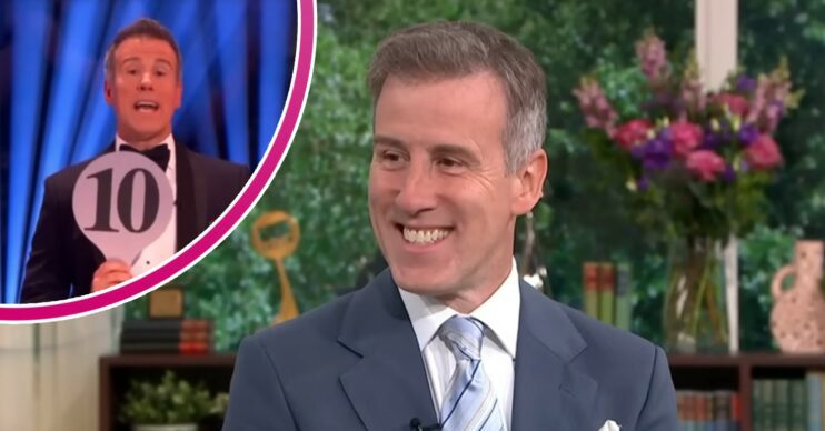 Anton Du Beke holding up Strictly score, and smiling on This Morning