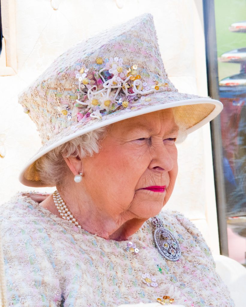 Queen Elizabeth II in white outfit 