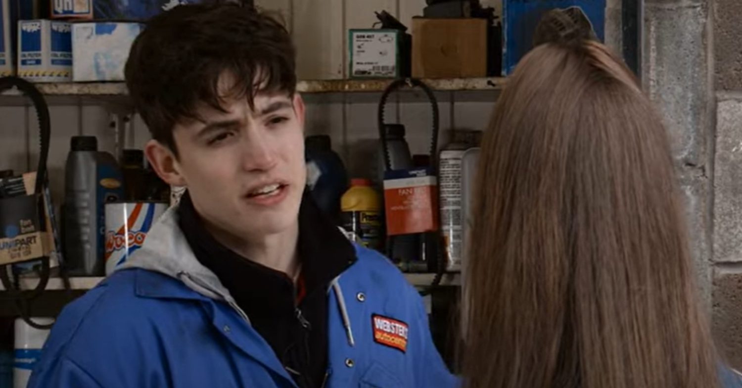 Coronation Street's Aaron is talking to Mia at the garage
