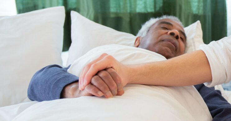 UK news: An old person lying in bed