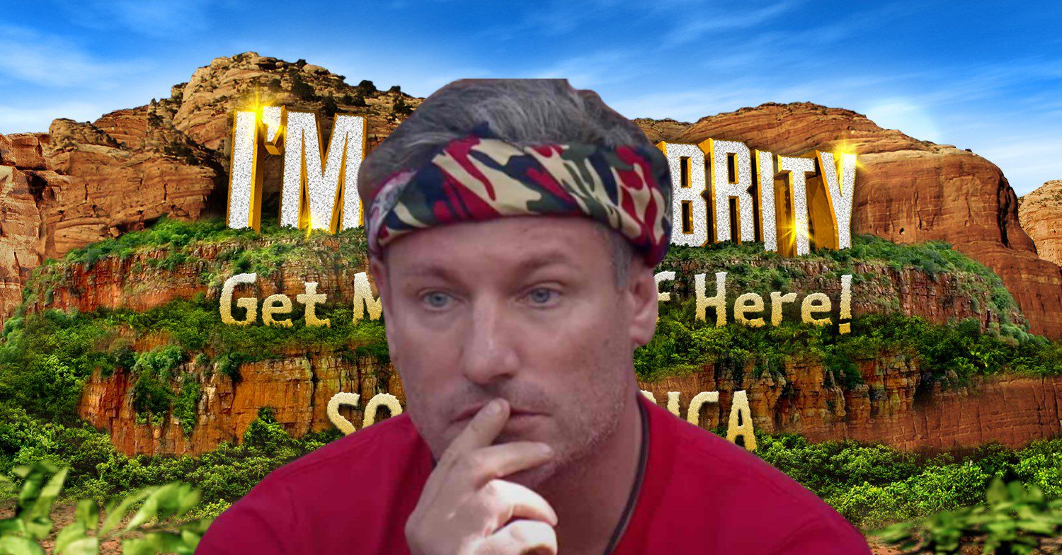 Dean Gaffney looking concerned with I'm A Celebrity South Africa logo in background