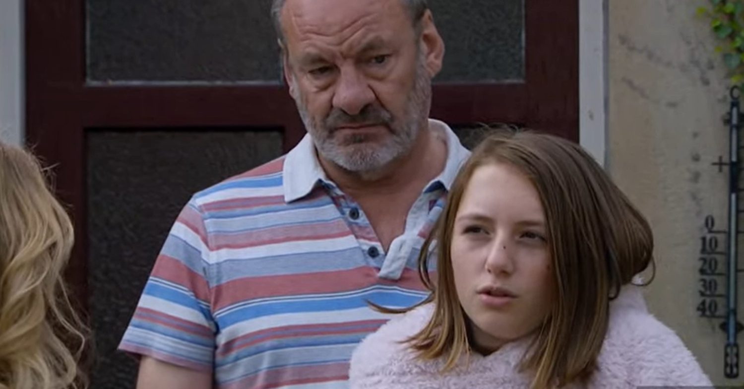 Emmerdale's Jimmy and Angel are standing in the doorway, looking at Nicola