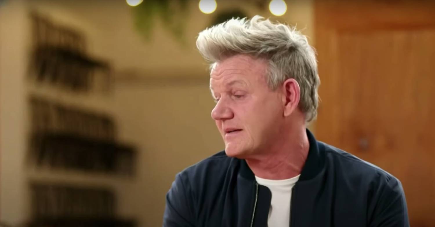 Gordon Ramsay looks to his side