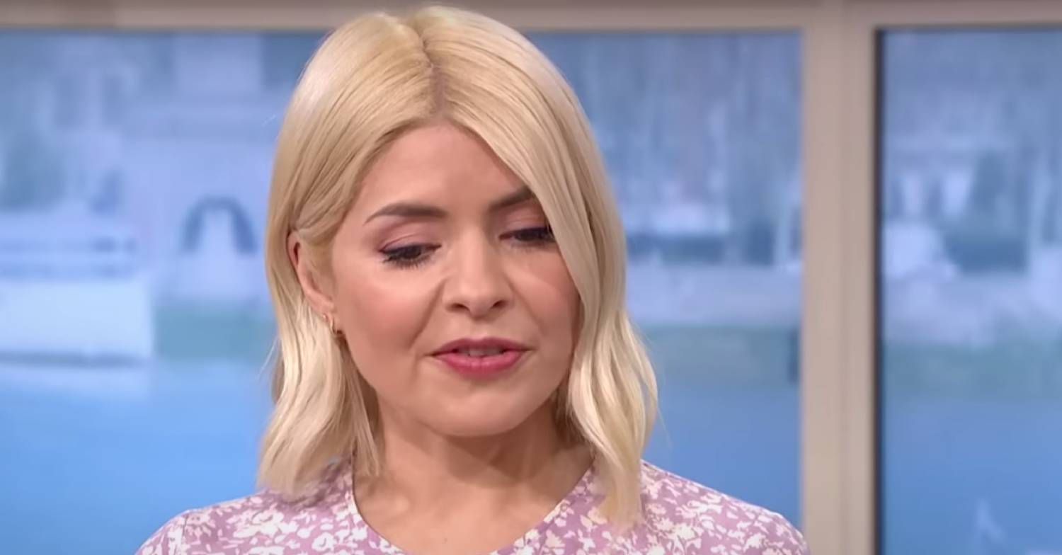 Holly Willoughby looks downards