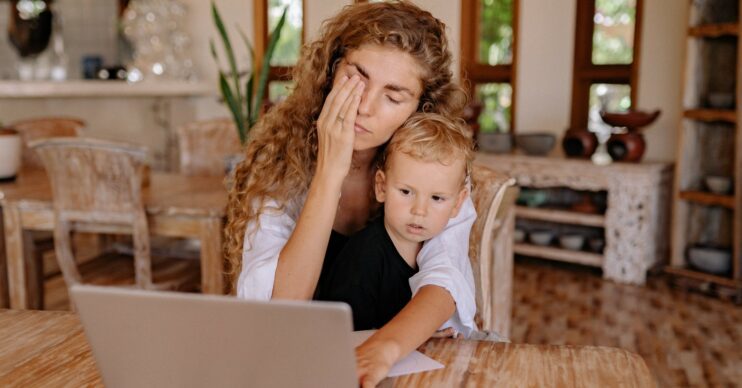 Miserable mum in workplace childcare