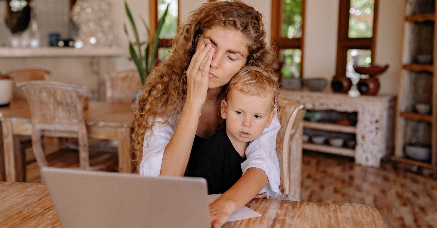 Miserable mum in workplace childcare