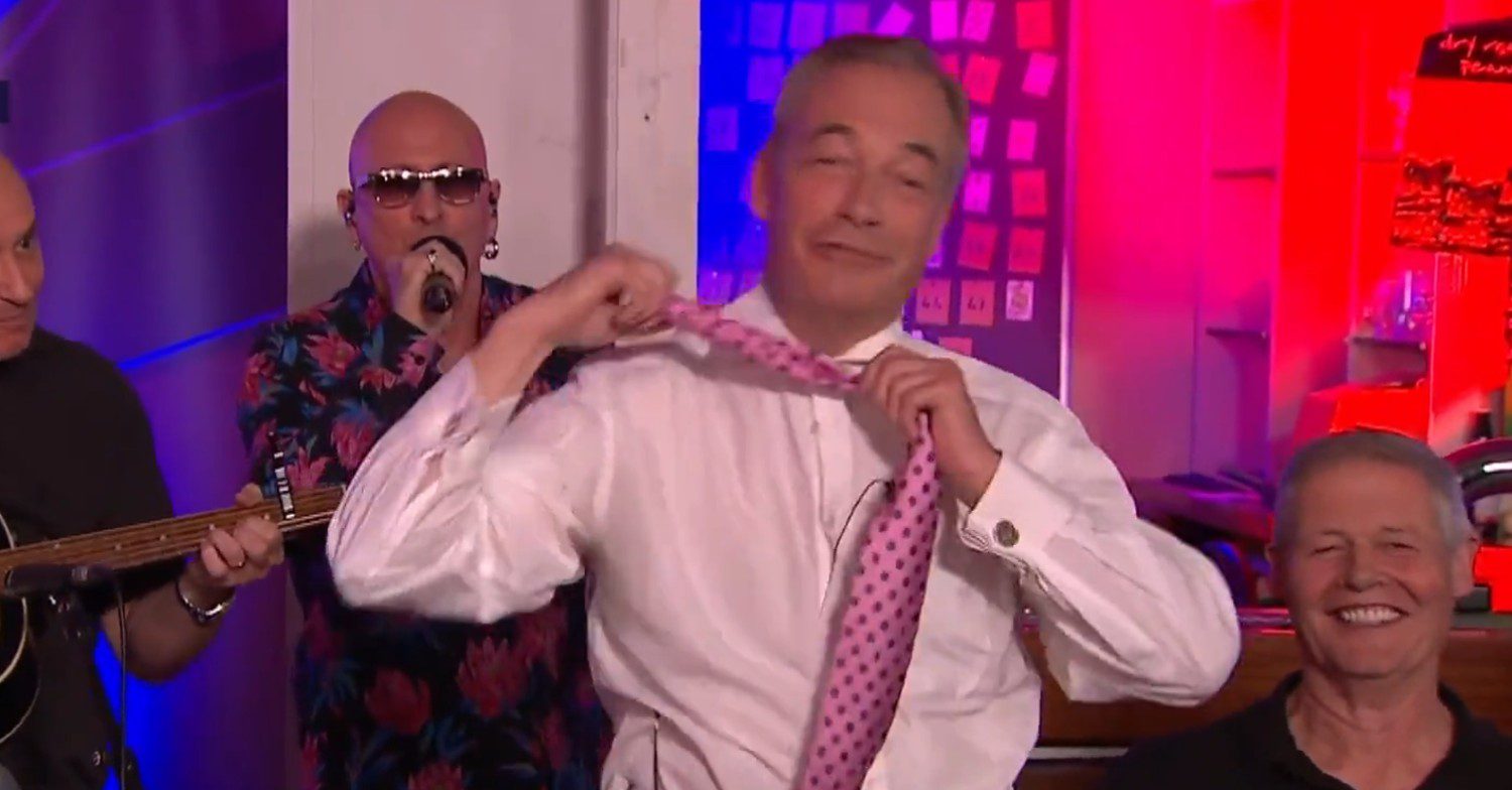 Nigel Farage rips his tie off in a striptease
