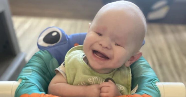 Baby Tate Walker smiles
