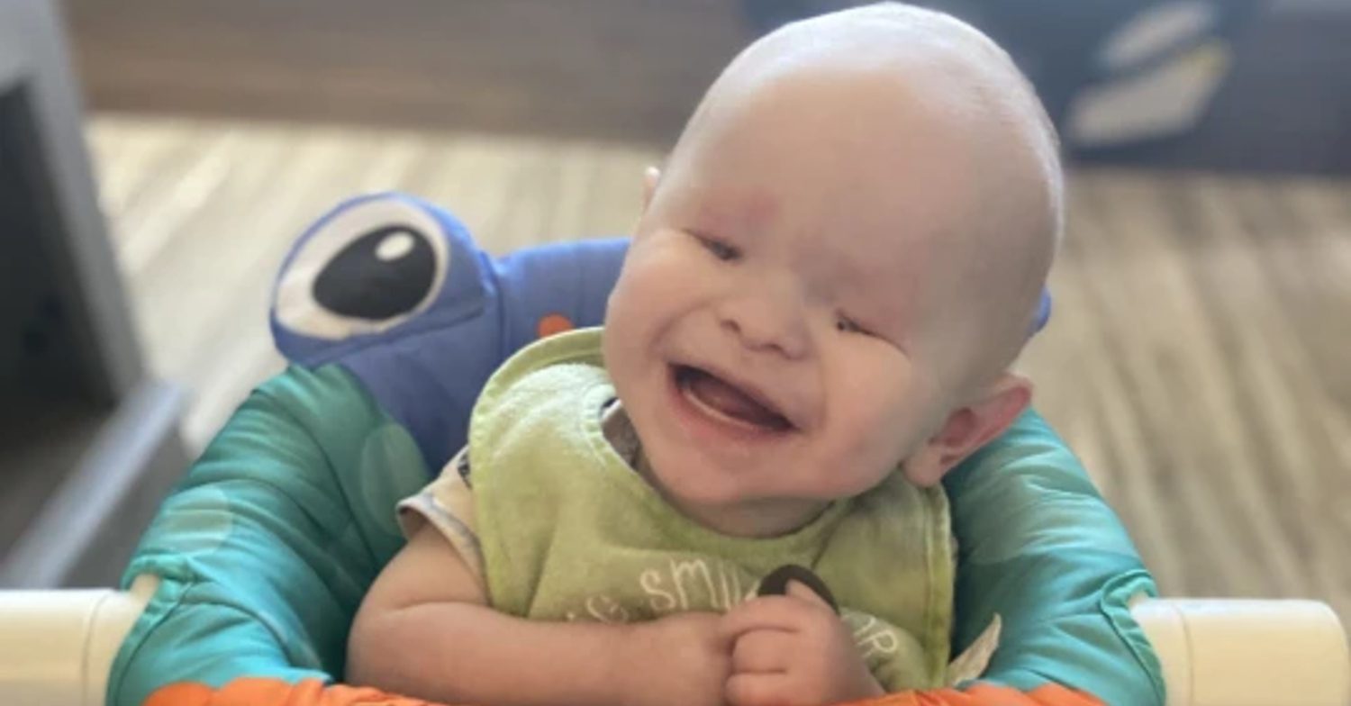 Baby Tate Walker smiles