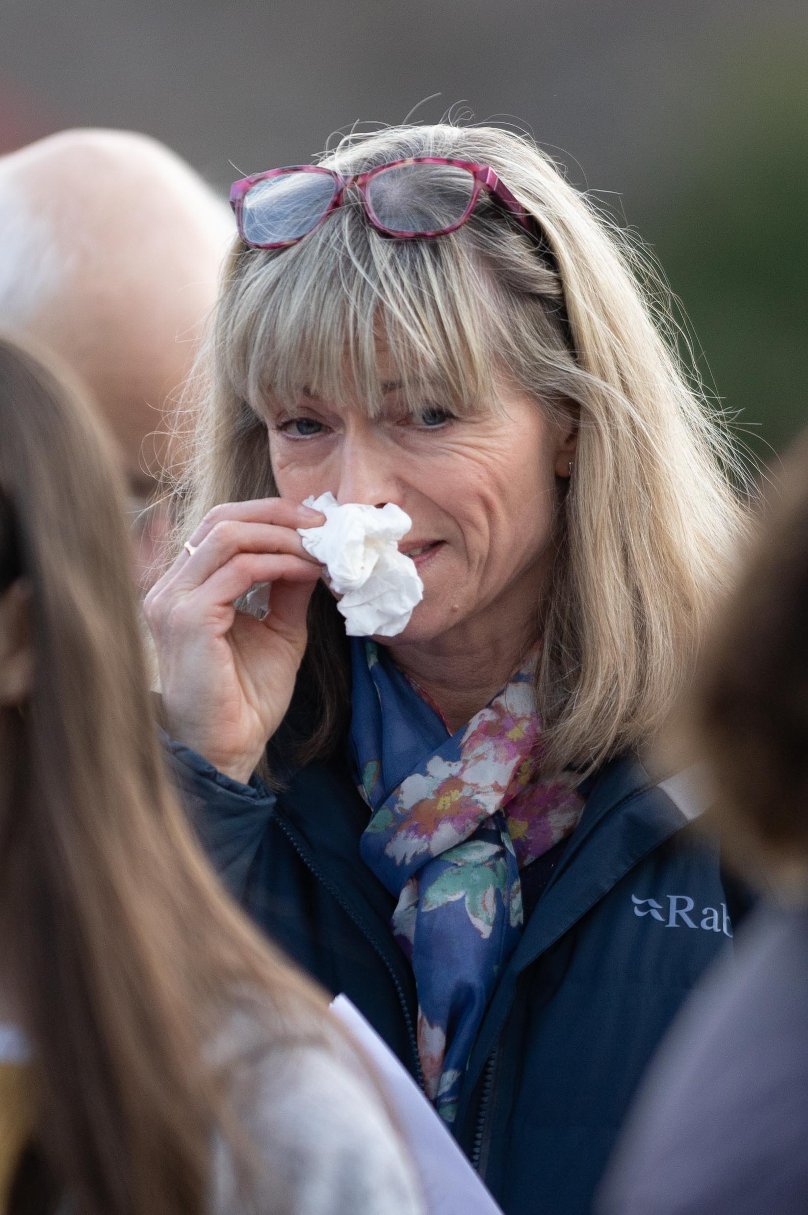 Kate McCann wiping her nose with a tissue