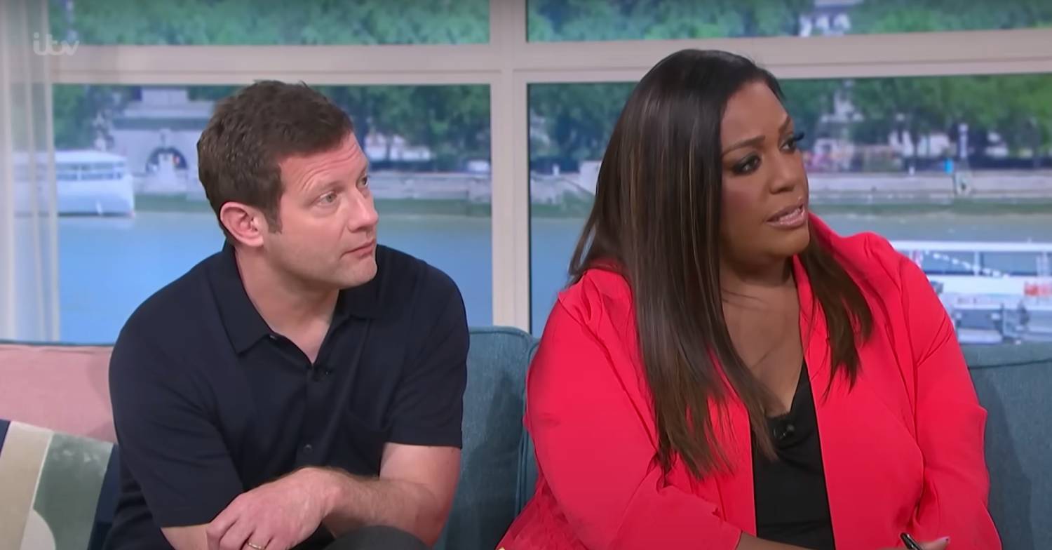 Dermot O'Leary leans in while Alison Hammond speaks