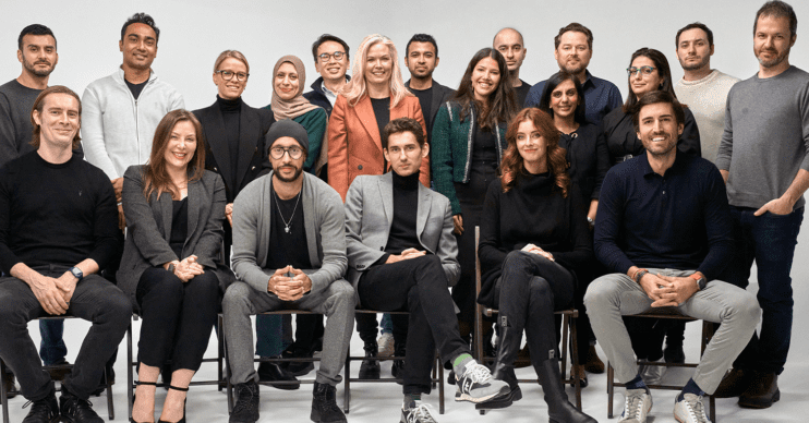 Workers sat together for a group photo