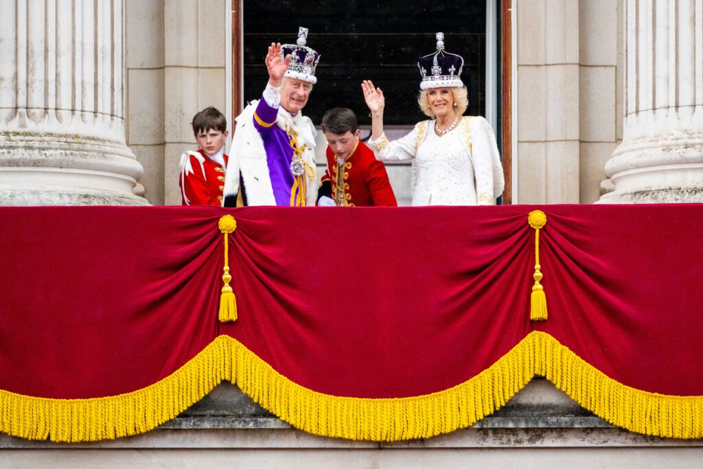 King Charles and Queen Camilla wave from Buckingham Palace balcony at their coronation