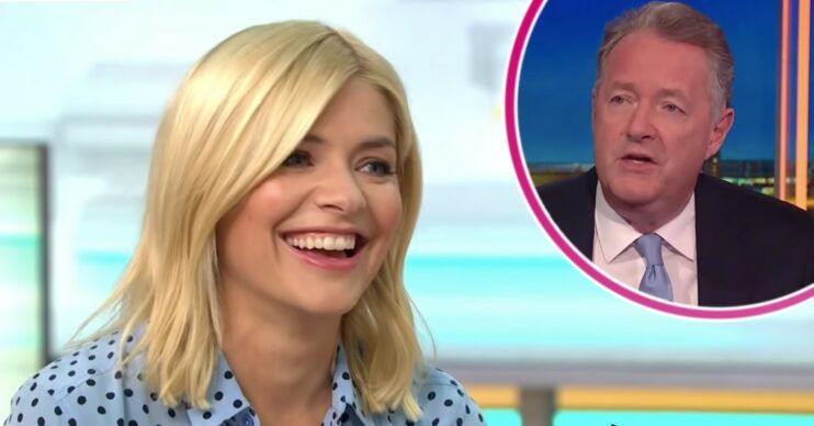 Holly Willoughby smiling with Piers Morgan