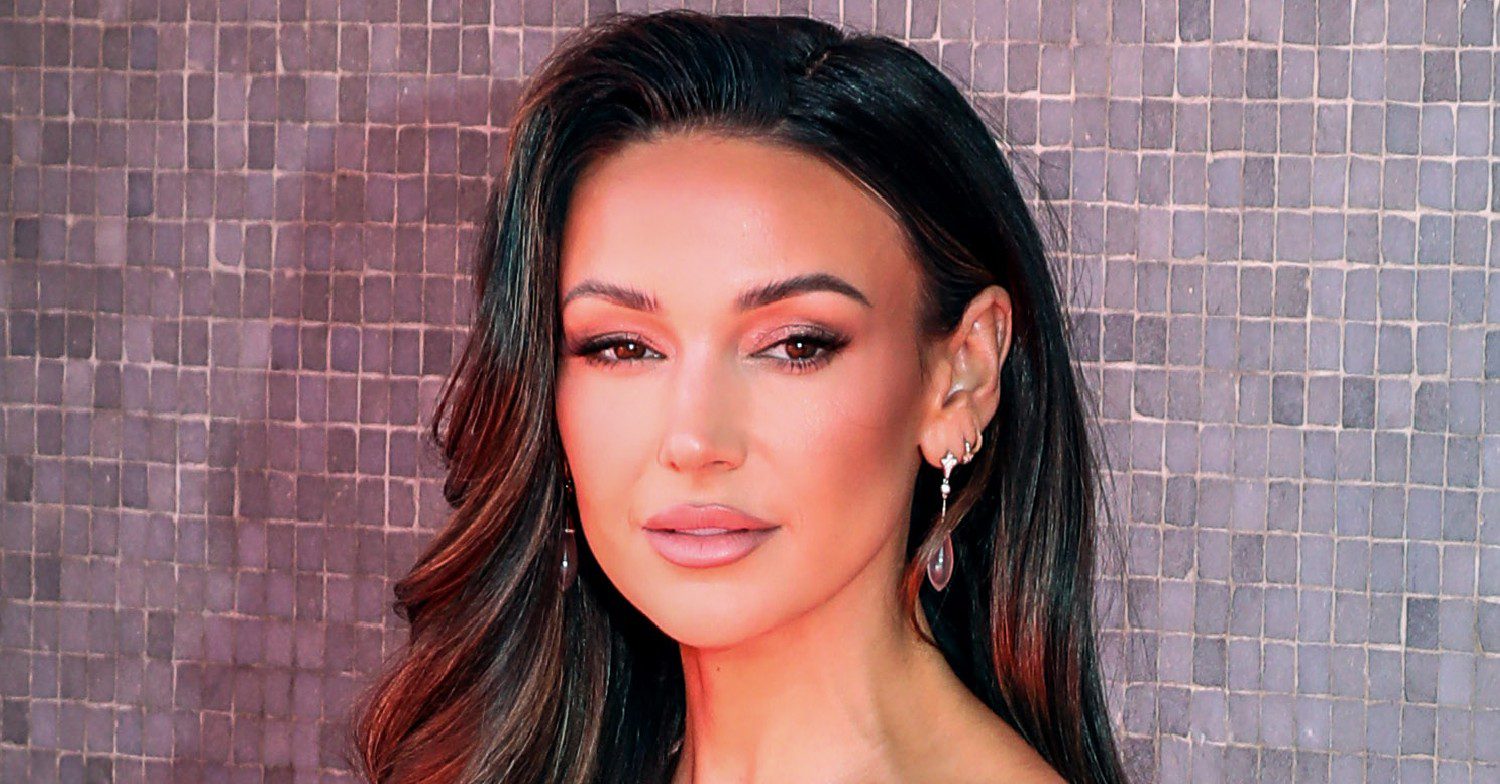 Michelle Keegan posing on a red carpet