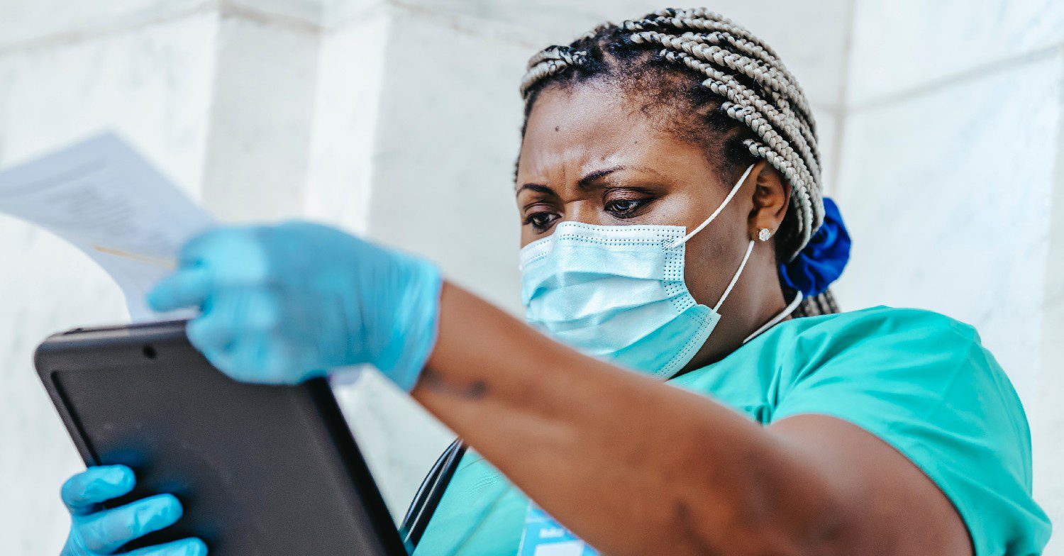 Nurse reading notes