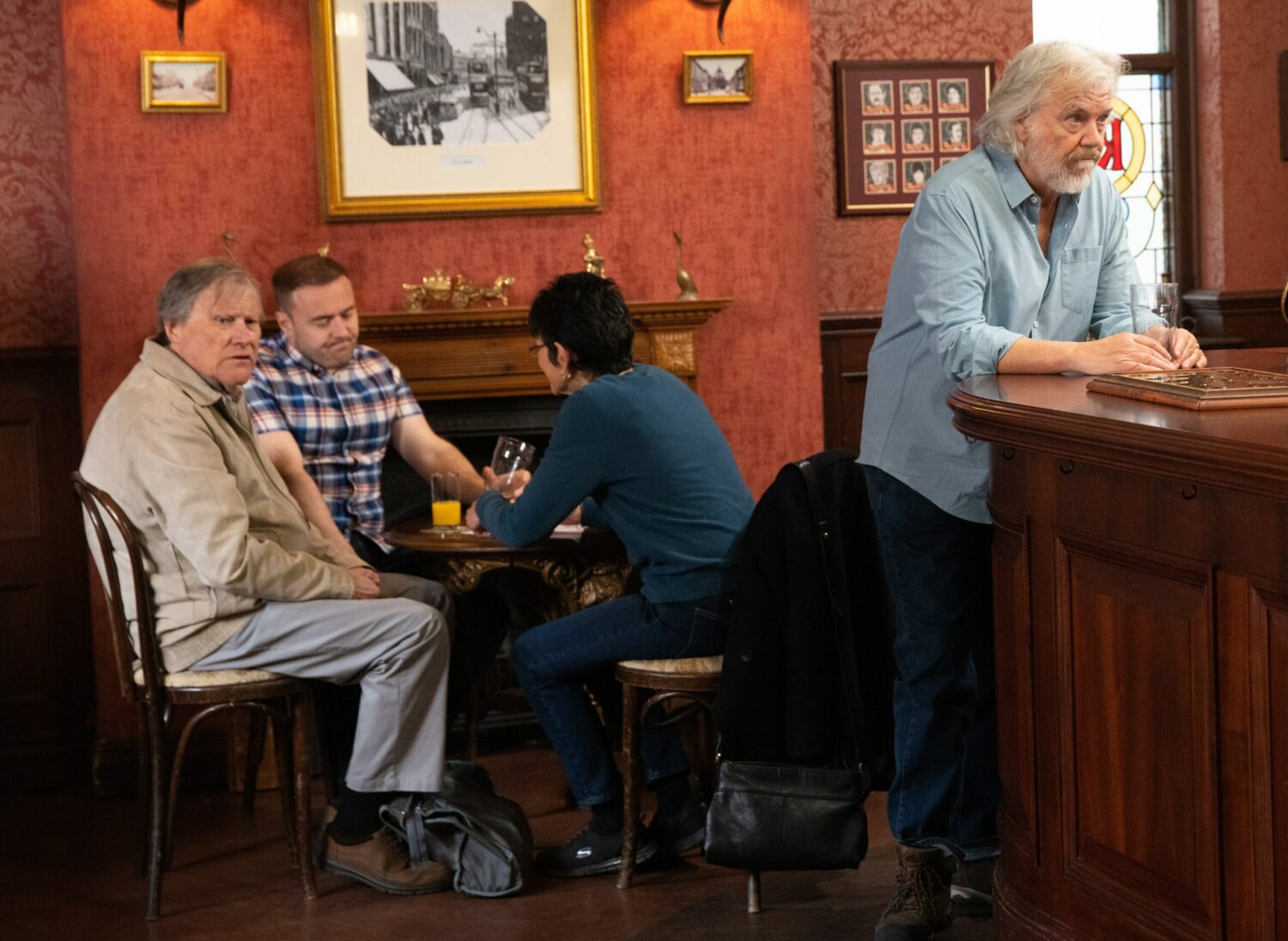 Stu in Corrie looks put out as Roy and Yasmeen do a pub quiz