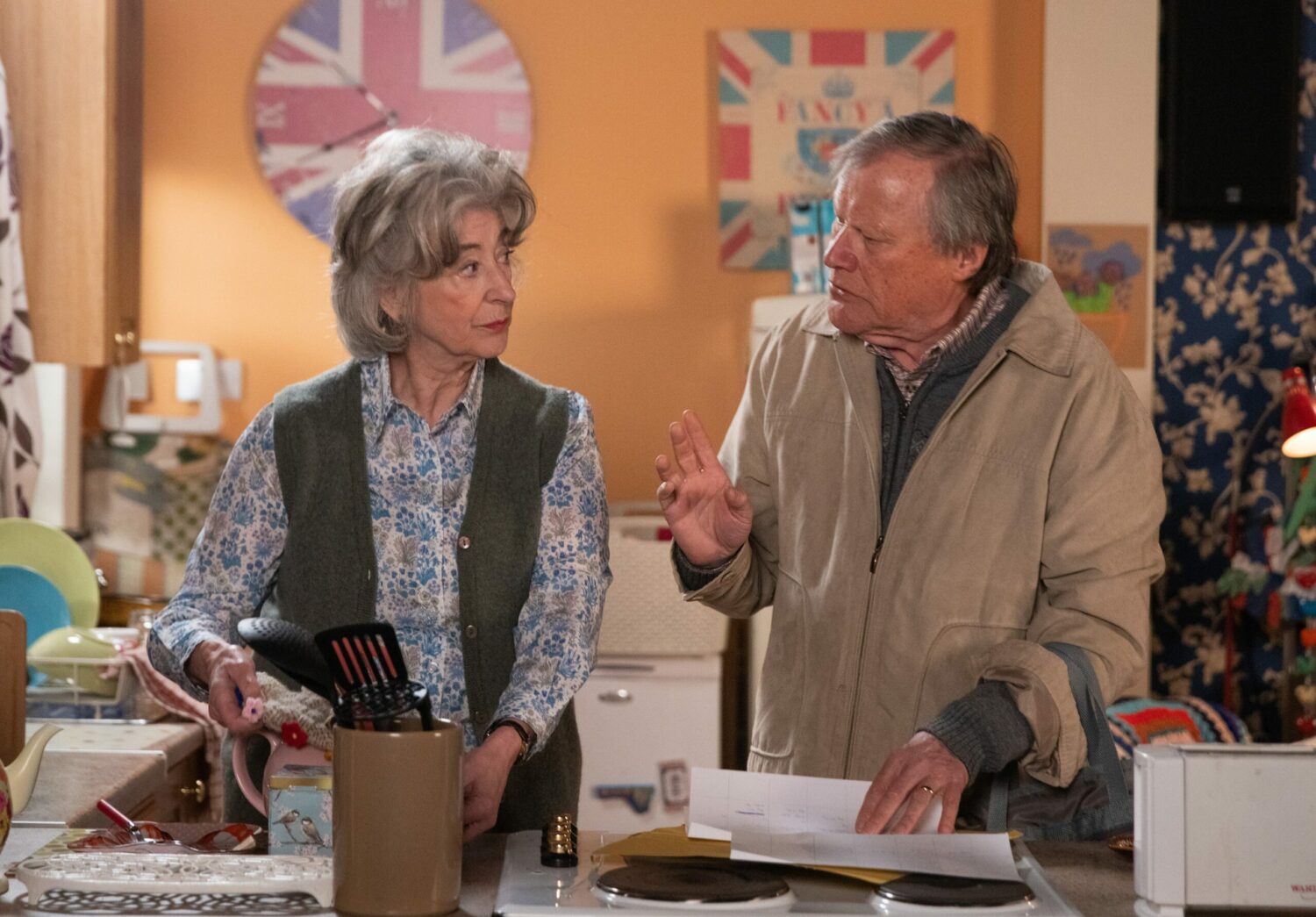 Roy Cropper [DAVID NEILSON] shows Evelyn Plummer [MAUREEN LIPMAN] the schedule he’s drawn up for Freddie’s care.